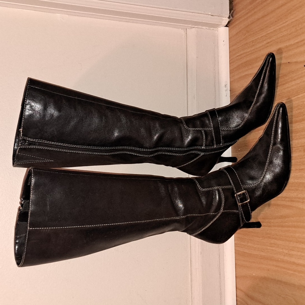 Tall leather black boots